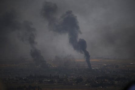 Smoke billows from targets in Ras al-Ayn, Syria, during a bombardment by Turkish forces in October 2019.