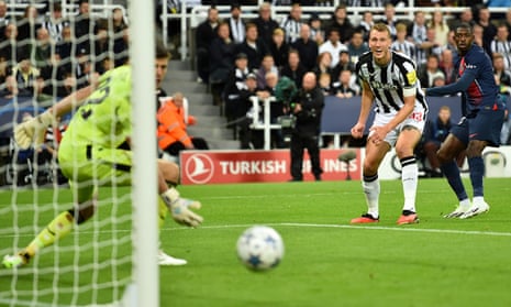 Ousmane Dembele (right) of PSG watches his shot goes wide during the Champions League group game at Newcastle United.