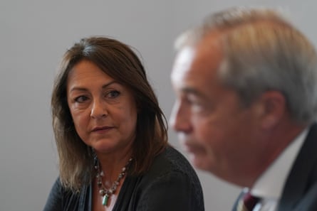 Close up of Kemkaran, and Farage out of focus.