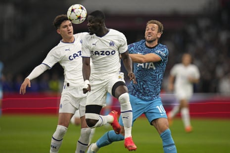 Marseille v Tottenham Hotspur: Champions League – live | Champions League 6 Harry Kane is crowded out by Eric Bailly.