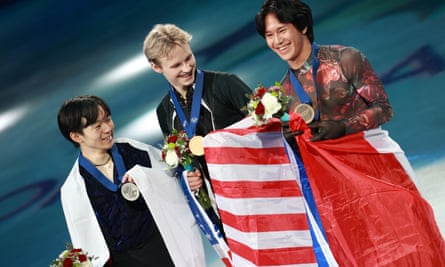 Ilia Malinin (centre) on the podium with Yuma Kagiyama (left), and bronze medalist Adam Siao Him Fa of France