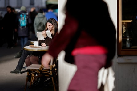 A reader in a Paris cafe.