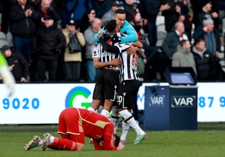St Mirren’s Toyosi Olusanya is mobbed by teammates after their win.