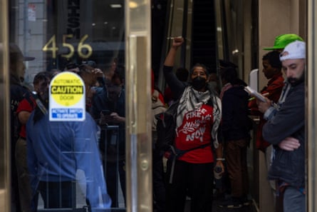 Pro-Palestinian protesters could be heard chanting in the lobby of the building where the Israeli consulate is located.
