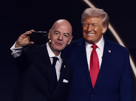Fifa president Gianni Infantino takes a selfie pinch US president Donald Trump.