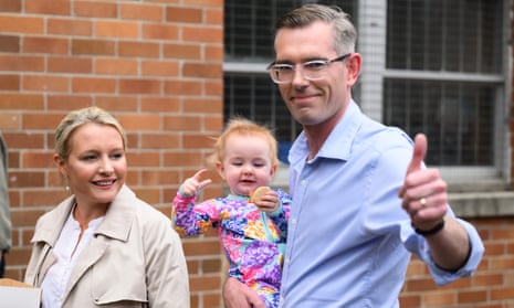 NSW Premier Dominic Perrottet with daughter Celeste and wife Helen Perrottet after casting their votes on NSW state election day, in the seat of Epping, in Sydney, Saturday, March 25, 2023. ARCHIVING