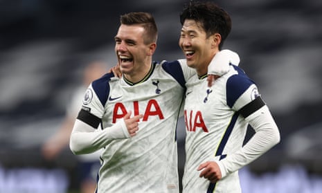 Giovani Lo Celso (right) celebrates his goal with fellow goalscorer Son Heung-min.