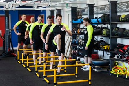 Darren England and others training at St George’s Park.