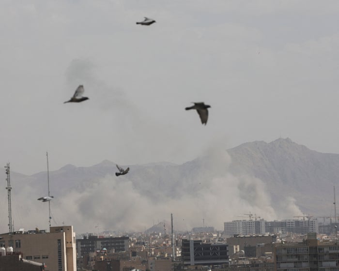 Smoke rises in Tehran after US and Israel launch joint attack on Iran – video