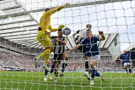 Dan Burn of Newcastle outjumps Dara O’Shea and Alex Palmer of Ipswich for his side’s second goal in the Magpies’ 3-0 win at St James’ Park