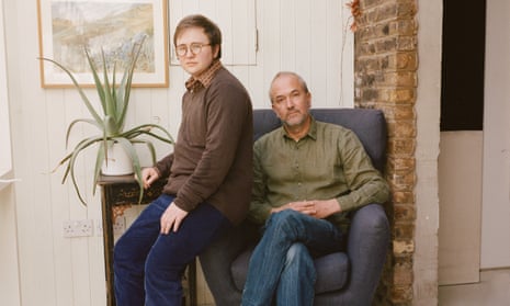 Felix Moore, left, with his father, Rowan Moore, at home in London