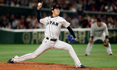 Takayuki Kishi throws a pitch for Japan against an MLB All-Stars side in 2018.