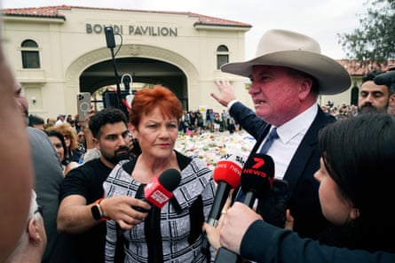 Pauline Hanson and Barnaby Joyce talk to the media at a floral tribute for victims of the Bondi beach massacre
