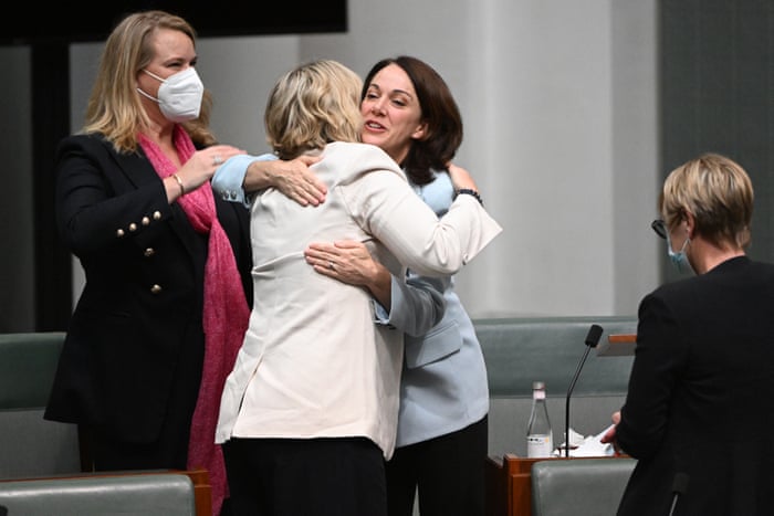 Sophie Scamps is hugged by independent member for Warringah, Zali Steggall after making her maiden speech.