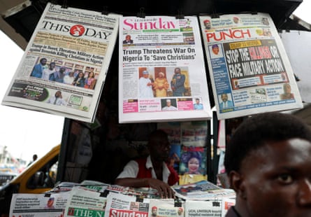 Newspapers in Lagos with articles reporting Donald Trump’s threat to Nigeria in November.