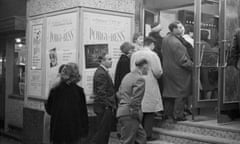 Alf Ramsey queues for a Friday night film in Liverpool.