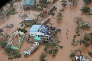 Survivors clinging to buildings in the district of Buzi, Mozambique