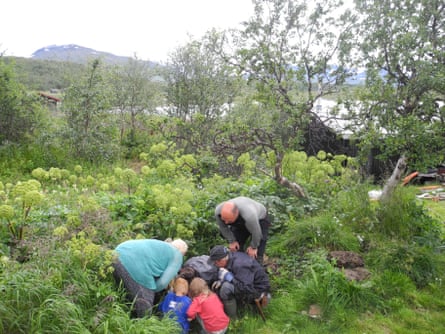 Researchers show compost samples to locals in Padjelanta national park, Sweden.