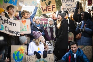 Swedish climate activist Greta Thunberg, center, is pictured during a “Fridays for Future” demo on the final day of the 50th annual meeting of the World Economic Forum, WEF, in Davos, Switzerland, Friday, Jan. 24, 2020. (Gian Ehrenzeller/Keystone via AP)