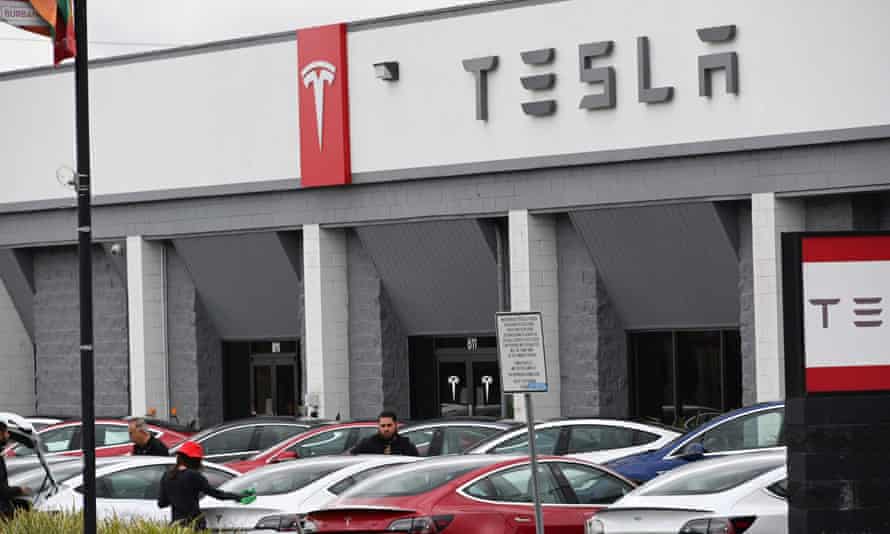 Elon Musk Reopens California Tesla Factory In Defiance Of Lockdown Order Elon Musk The Guardian Elon Musk Reopens California Tesla Factory In Defiance Of Lockdown Order Elon Musk The Guardian