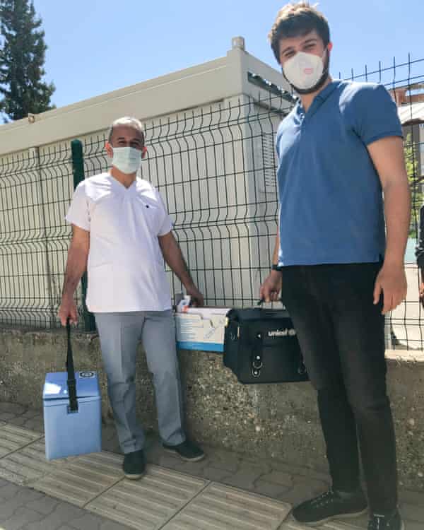 Health workers gear up for a day of door-to-door ‘vaccination persuasion’.