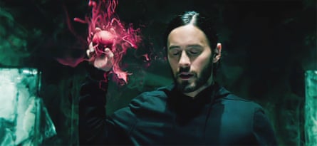 A man holds an animated red orb