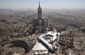 The Mecca clocktower overlooks the Grand Mosque and Ka’bah, Islam’s holiest site, as Muslims perform the ﬁnal rites of this year’s hajj pilgrimage.