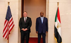 Mike Pompeo, left, stands with Sudanese Gen. Abdel-Fattah Burhan, right, the head of the ruling sovereign council, in Khartoum.