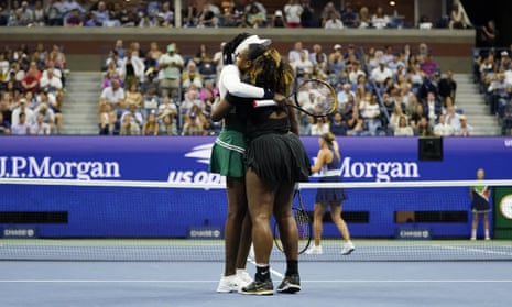 Serena and Venus Williams embrace after their loss to Linda Nosková and Lucie Hradecká at the US Open on Thursday night