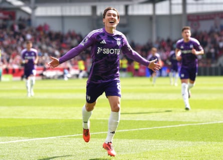Harry Wilson celebrates Fulham’s third goal at Brentford in their 3-2 win on 18 May.
