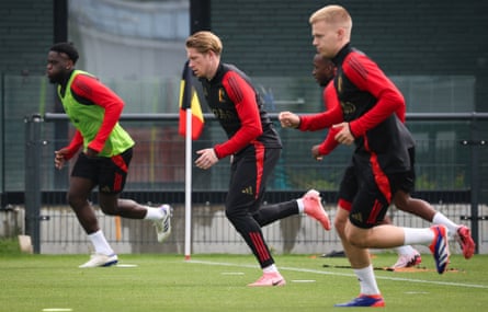 The Belgium midfielders Mandela Keita (left), Kevin De Bruyne (centre) and Arthur Vermeeren warm up during a training session as part of the team’s preparation for Euro 2024.