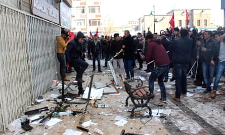 People protest in front of the offices of the pro-Kurdish Peoples’ Democratic party (HDP) following a suicide car bombing on Saturday in Kayseri.