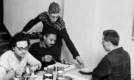 The social and cultural theorist  Stuart Hall (seated facing) at the Partisan.