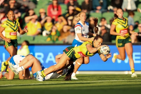 Isabelle Kelly scores a try for Australia against England at HBF Park