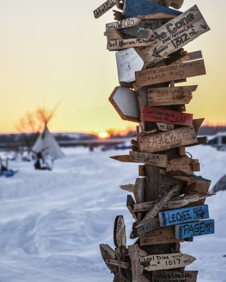 A signpost pointing to home, erected in Fall 2016 by those who came to camp at Standing Rock. It is now on display on the Smithsonian Museum in Washington, DC.