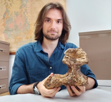 The University of Queensland’s Jorgo Ristevski holds the skull