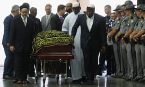 The casket carrying Muhammad Ali arrives for a prayer service at the Kentucky Exposition Center in Louisville, Kentucky.