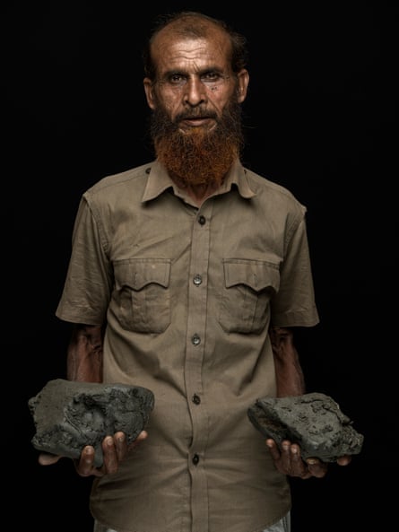 Abdur Rashid Gazi, labourer who is building higher ground for his house in Nalian to avoid future flooding