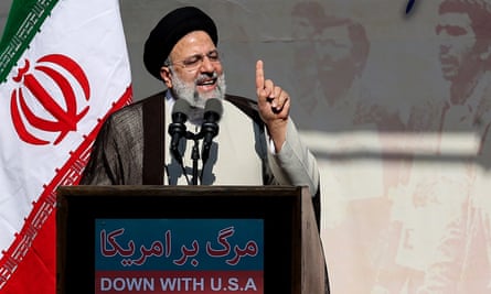 President Ebrahim Raisi addresses a rally outside the former US Embassy in Tehran