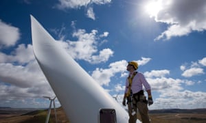 Sturt Daley, site manager, stands atop a wind turbine nacelle at Capital Wind Farm in Bungendore, South Australia