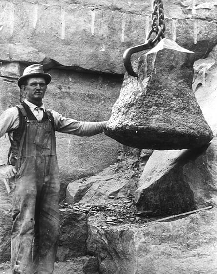 A foreman uncovers a fossilised tree trunk, thought to be over 350 million years old, at a quarry in upstate New York in the 1920s.