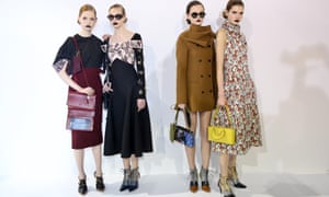 Models pose backstage at the Dior show