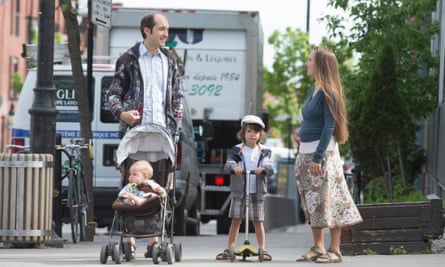 Daniel Goldsmith and Giulia Zaccagnini walk to the park with their children in Montreal.