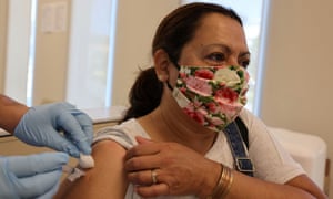 Rosa Hernandez, 56, is given a flu vaccine in East Los Angeles, California Monday.