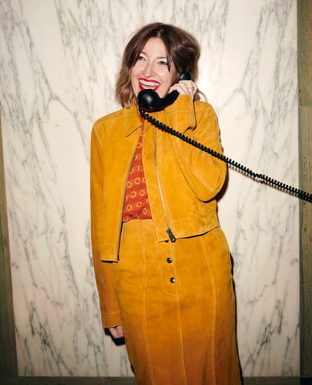 Kelly Macdonald wears jacket and skirt by paulsmith.com and sweater vest by madeleine-thompson.com