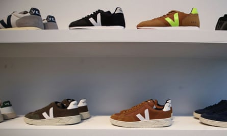 Sneakers on two shelves, made of organic and vegan fabric.