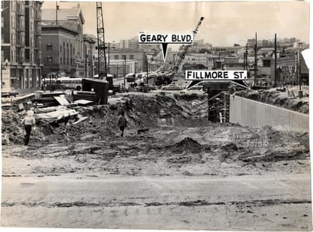 A black-and-white image of a pile of rubble and construction vehicles, with ‘Geary Blvd.’ and ‘Fillmore St.’ written onto the photograph.
