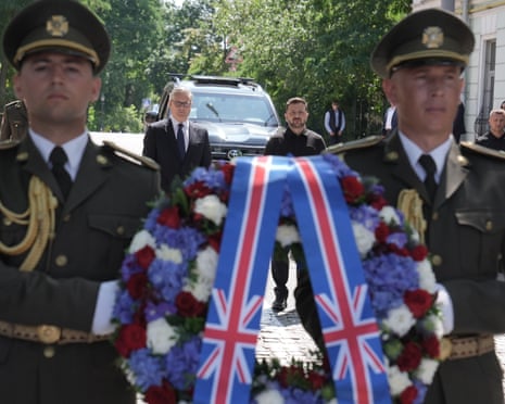 Prime minister Sir Keir Starmer and Ukrainian president Volodymyr Zelensky pay their respects at a wreath laying at the Wall of Remembrance of the Fallen for Ukraine in Kyiv.