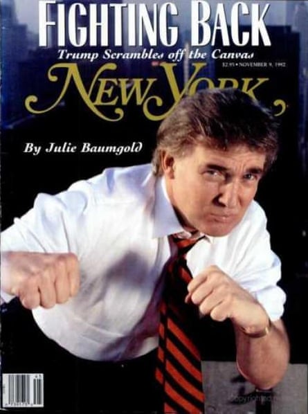 Trump with his sleeves rolled up in a boxing pose.