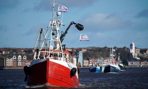 Boats flying pro-Brexit flags sail on the River Tyne during the Fishing For Leave flotilla.